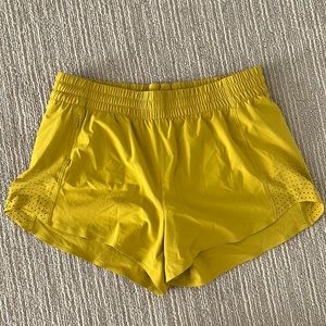 New without tags. Size small Athleta shorts in a really pretty mustard color.